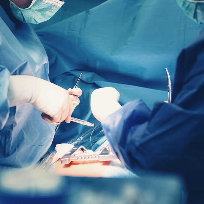 surgeons working on a surgery