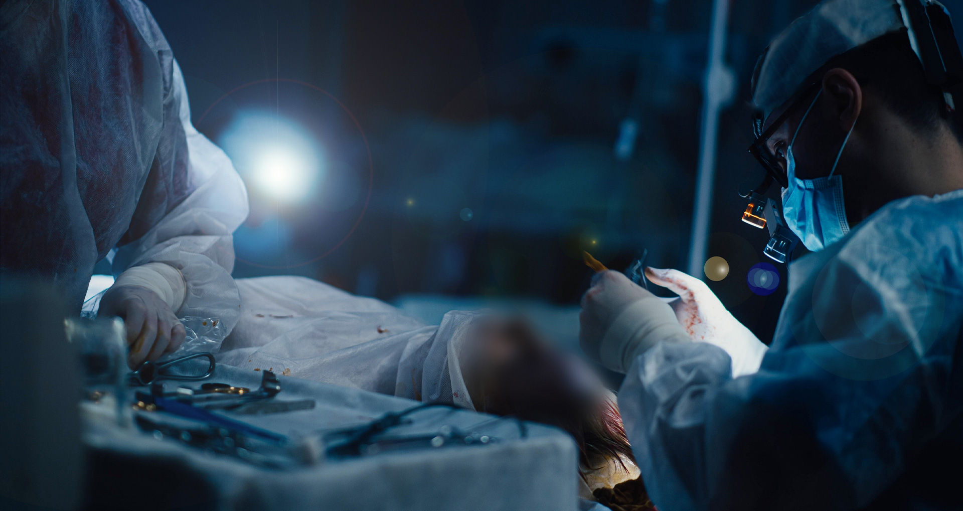 surgeon and assistant in operating room